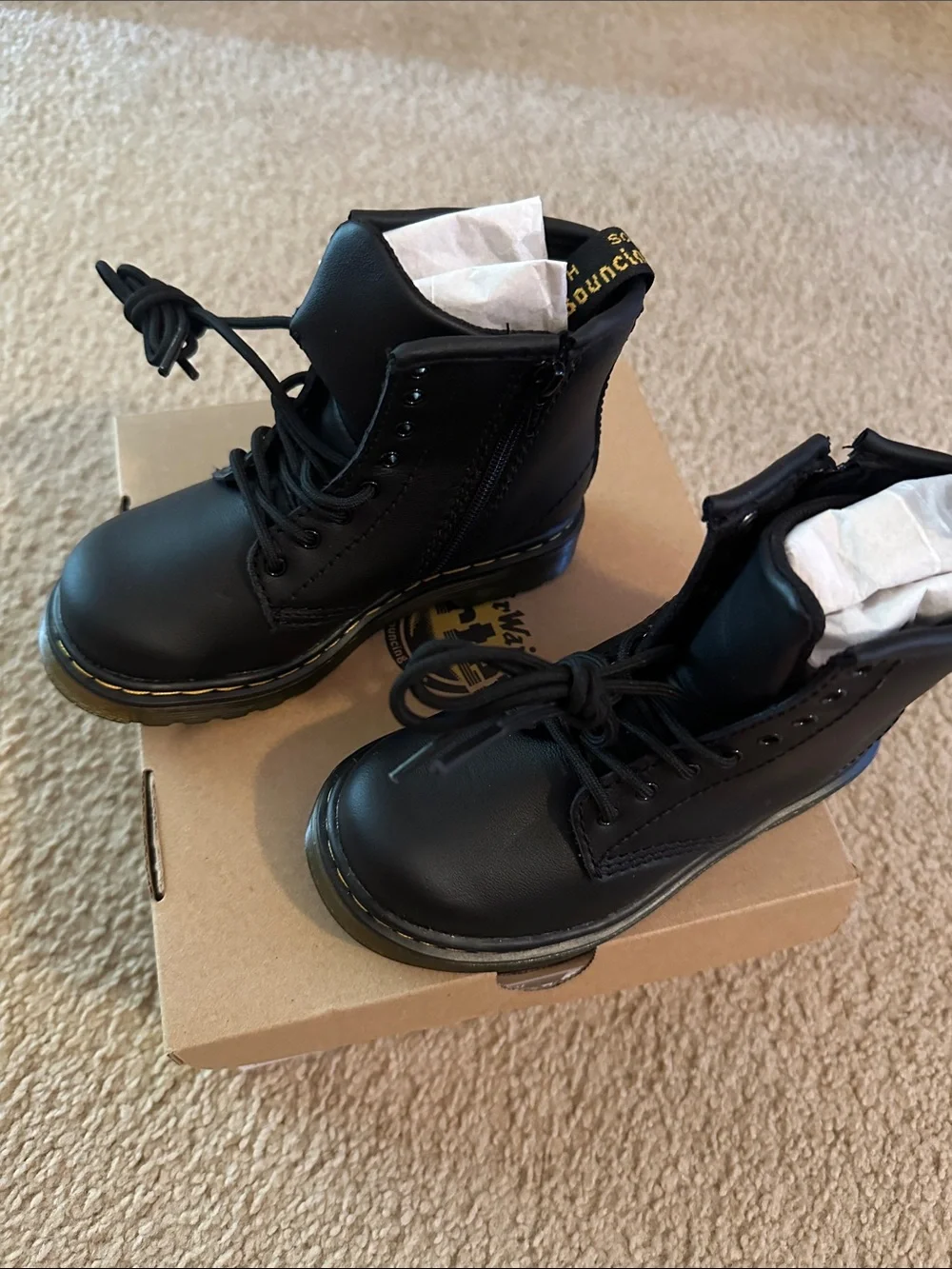 Dr. Martens Black Leather Ankle Boots with Yellow Welt Stitching